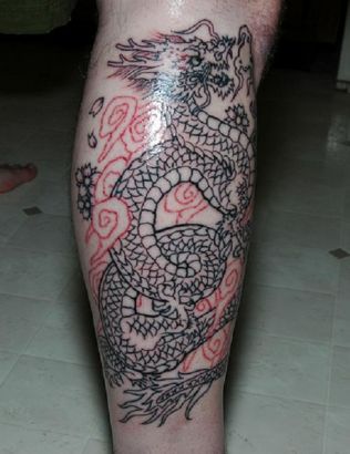 Chinese Dragon Pic Tattoo On Leg